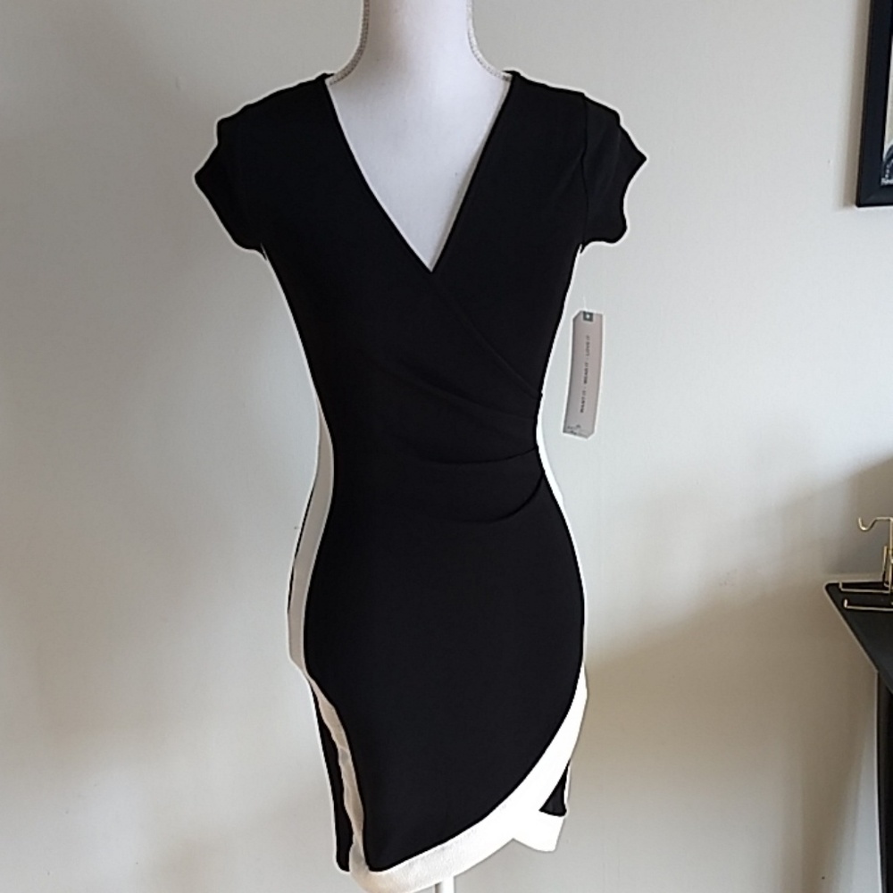 Chic black party dress by Almost Famous NWT